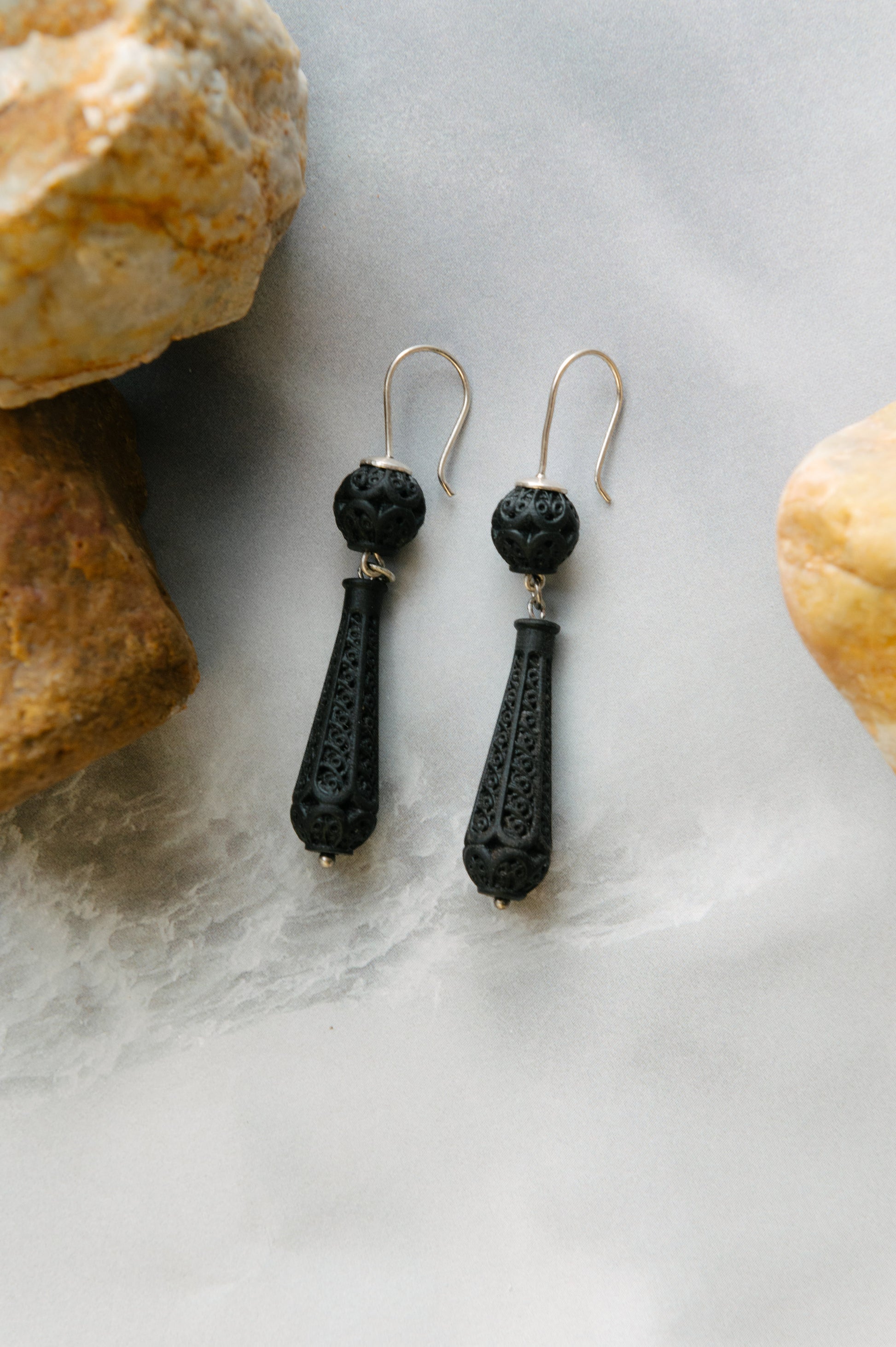 Pendentes de fuso ou maza de ébano